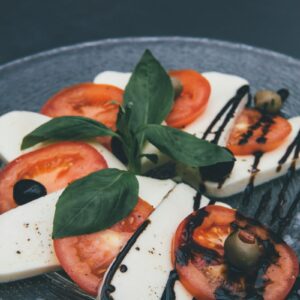 closeup photo of tofu and tomato slices